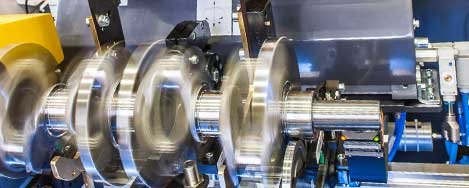Balancing machines for crankshafts
